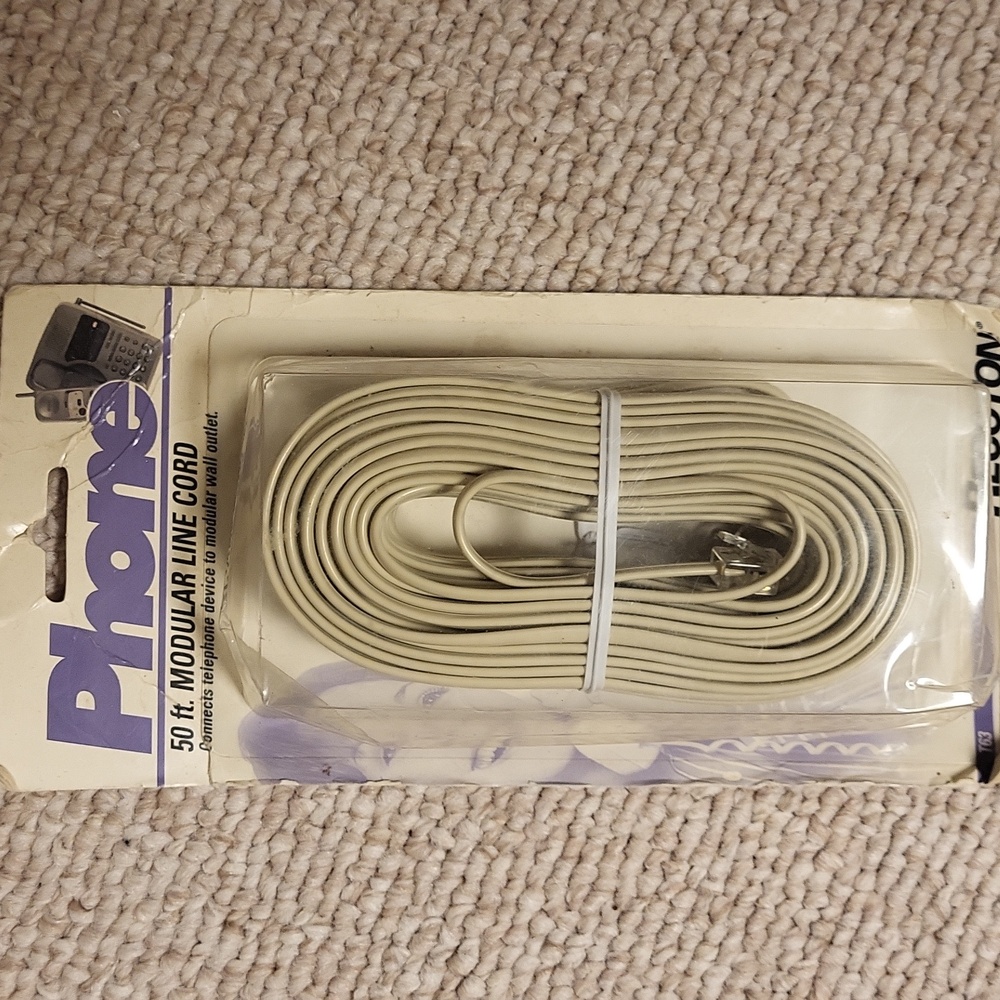 New 50 foot modular  telephone line cord to connect to modular wall cream